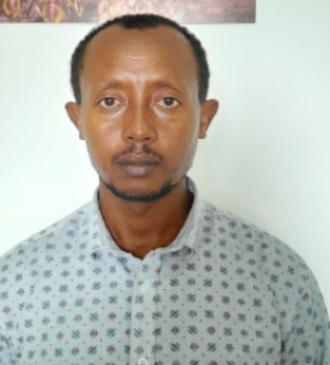 Headshot-style photo of IYF team member.