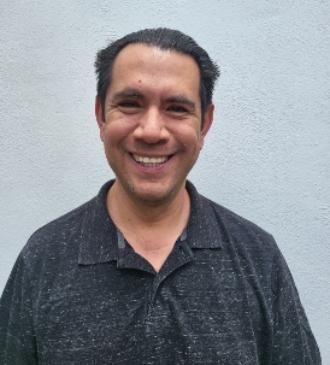 Headshot-style photo of IYF team member.