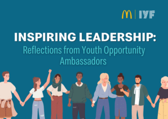 An illustrated banner shows diverse young people standing in a row holding hands. The text reads: INSPIRING LEADERSHIP: Reflections from Youth Opportunity Ambassadors with McDonalds and IYF logos at the top right.