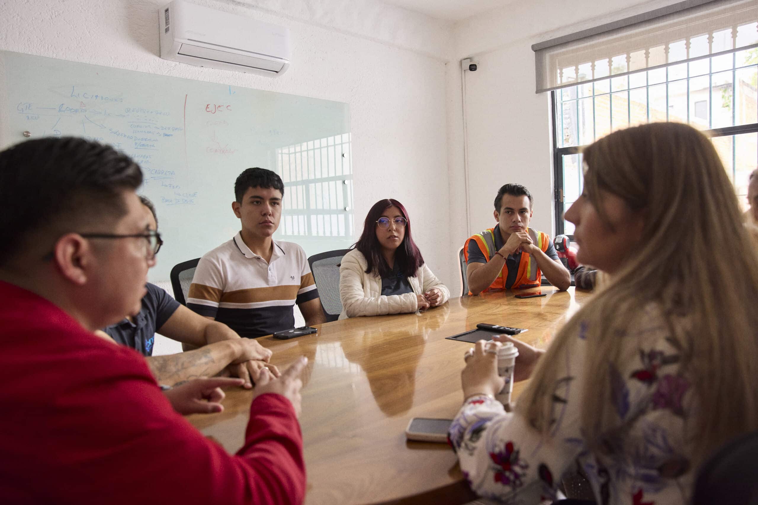 Youth chatting in a classrom